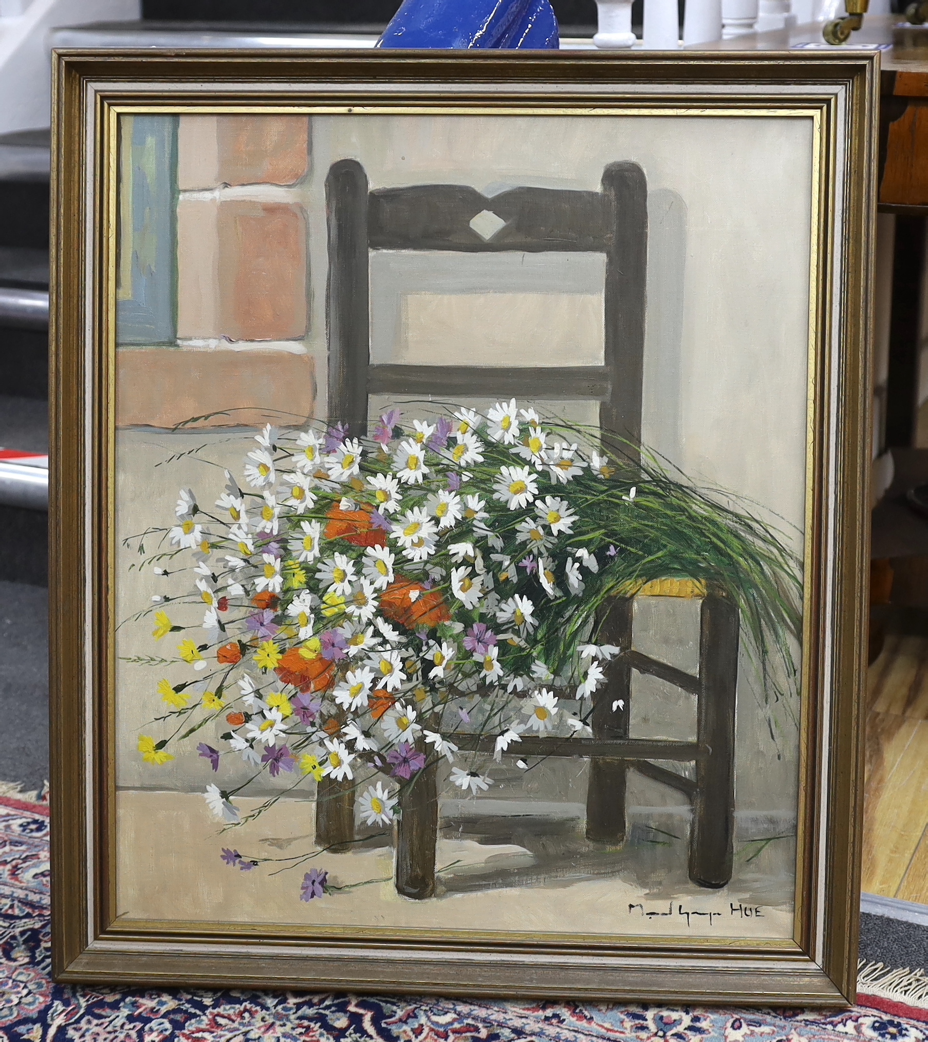 Marcel Georges Hue (b.1907), oil on canvas, Still life of flowers on a chair, signed, 63 x 53cm